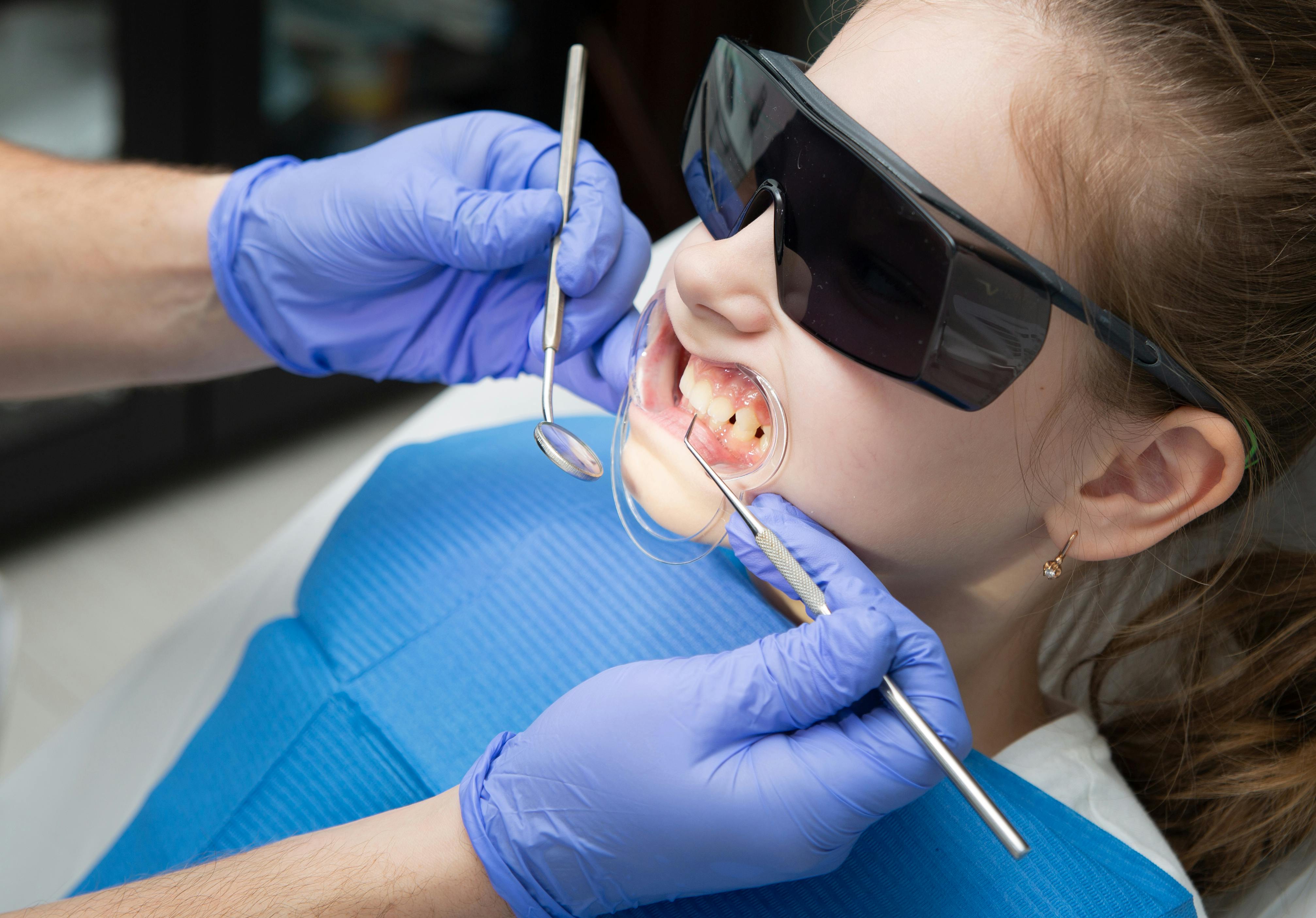 Young patient receiving a friendly dental exam